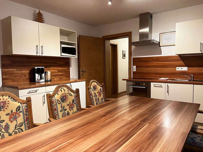 Guest kitchen with dining table