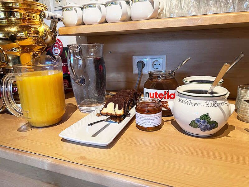 Juices, water, cakes, Nutella and jam
